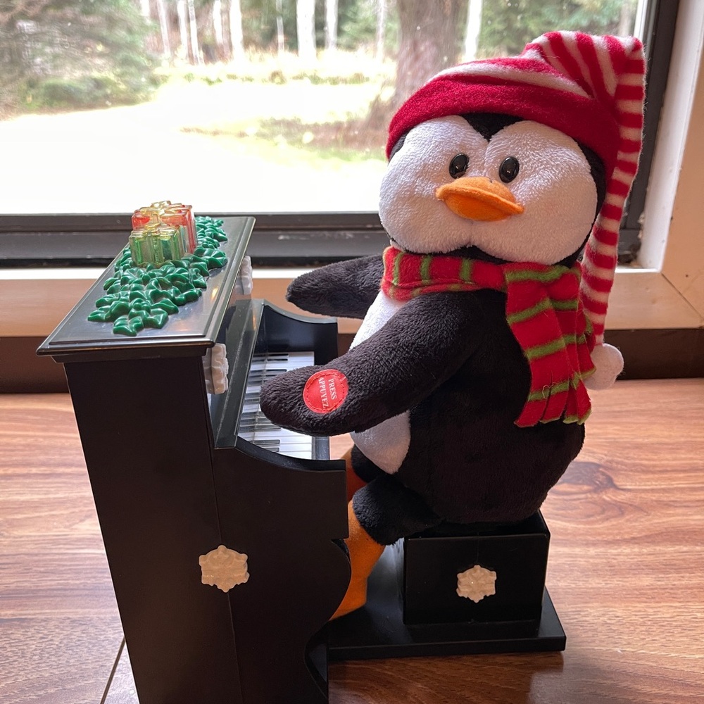 Christmas animated plush Penguin playing the piano sings 3 carols